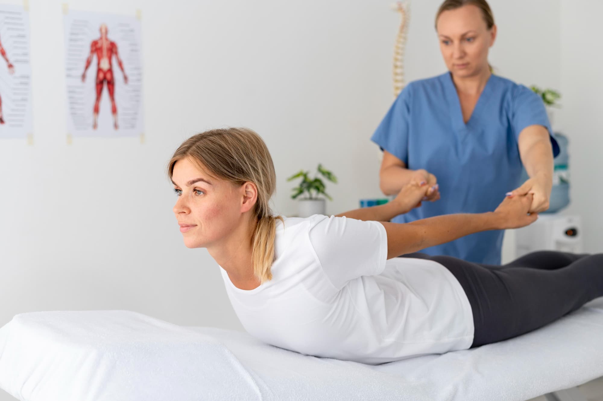 Manual therapy — physiotherapist performing shoulder treatment